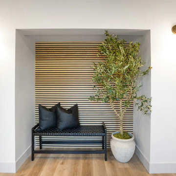 Entry Bench Nook with Wood Slat Wall and Brass Sconces – Beacon Hill Seattle