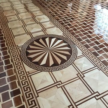 Decorative border frames the flooring much like a picture frame