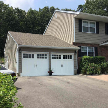 Two Traditional Carriage House Garage Doors in White