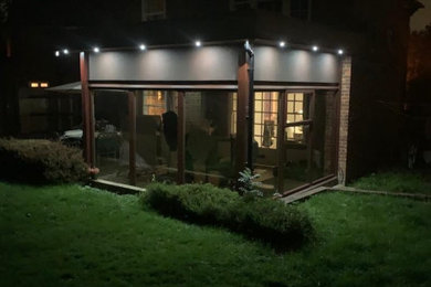 Photo of a contemporary conservatory in London.