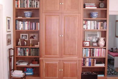 Cherry built-in TV cabinet and bookcases
