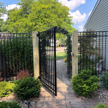 6' Ornamental Aluminum Black Fence installed on 6x6 treated pine posts