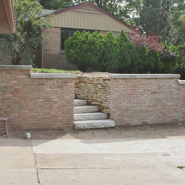 Faux Limestone Steps And Rebuilt Retaining Wall