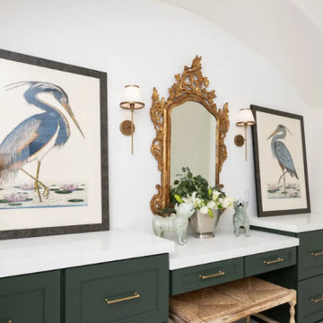Classic Vanity Nook with Ornate Mirror and Coastal Art