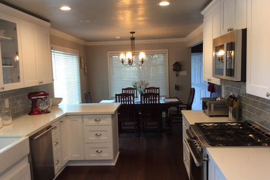 Example of a transitional kitchen design in New Orleans