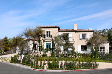 Example of a tuscan exterior home design in Orange County