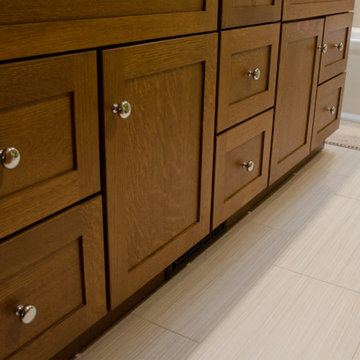 The bath has a warm spa-like feel, thanks to the heated floor.