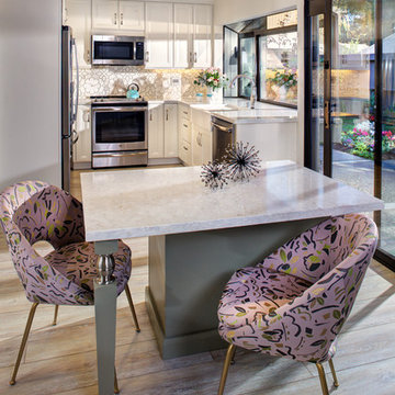 Overview of small kitchen remodel with island.