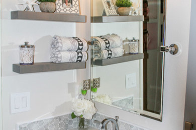 Bathroom - small contemporary gray tile and porcelain tile porcelain tile and gray floor bathroom idea in Orange County with gray cabinets, a one-piece toilet, gray walls, a drop-in sink, quartz countertops and shaker cabinets