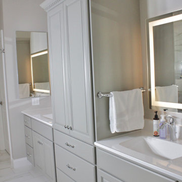 Intellectual Grey double vanity with white cultured marble and a linen tower