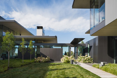 Home design - huge contemporary home design idea in Denver