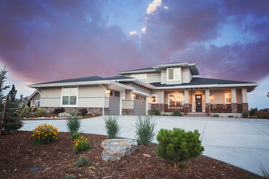 Large craftsman gray two-story mixed siding house exterior idea in Denver with a hip roof and a shingle roof