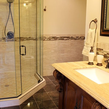 Traditional Bathroom With Brown Marble Floor & Travertine Porcelain Tile Walls