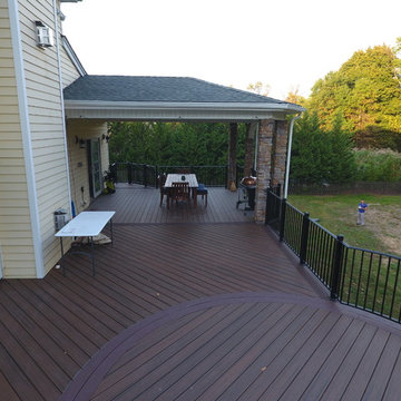 State of the Art Trex Deck, Curved Stairs, Hip-Roof