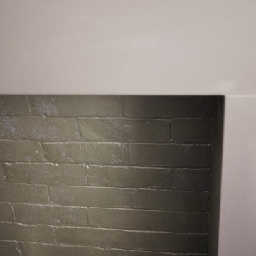 Fireplace refaced with Dekton matte black
