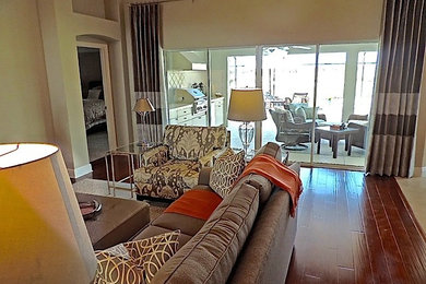 Example of a transitional family room design in Orlando