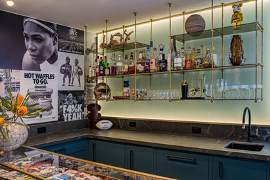 Example of a trendy home bar design in Sacramento