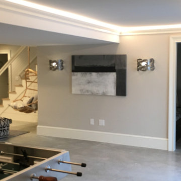 A fully equipped laundry room with a built ins