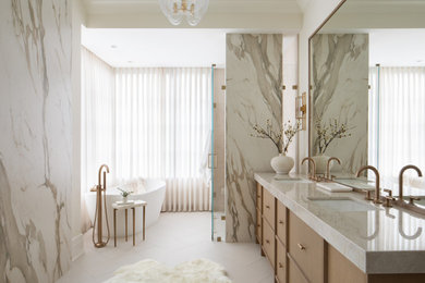 Large minimalist beige tile double-sink bathroom photo in Chicago with flat-panel cabinets, quartzite countertops, a hinged shower door, beige countertops and a built-in vanity