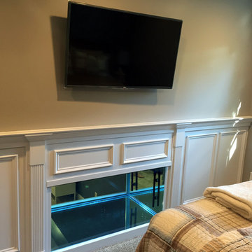 Basement renovation with Custom fish tank built in