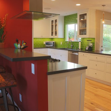 Clean White Cabinets Complement Lime Green Backsplash Juxtaposed With Brickhouse