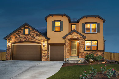 Trendy beige two-story stucco exterior home photo in Denver