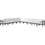 Meridian Furniture - Nizuc Water Resistant Patio L-Shaped Modular Sectional, White, 10-Piece: 7 Armless Chair, 3 Corner Chair, Dark Gray Aluminum Frame - Pick and choose your favorites from the Nizuc collection to create a modular seating group the whole gang will enjoy. The sturdy aluminum frame provides dependable support for friends and family as they relax and unwind, and the resilient white water resistant fabric stands up to the elements without losing its beautiful demeanor, so you can count on it lasting for the long haul. Latches beneath these seating pieces help you easily attach them to one another for convenient setup.