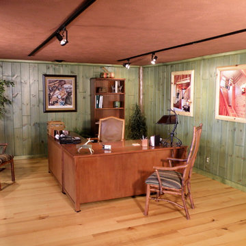Knotty pine walls stained with a semi-transparent green