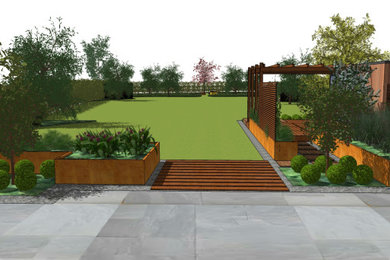 Inspiration for a large farmhouse back full sun garden for summer in Sussex with natural stone paving and a wood fence.