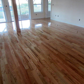 MONTAUK NEW CONSTRUCTION: 3 1/4" #1 RED OAK INSTALLED AND FINISHED NATURAL!