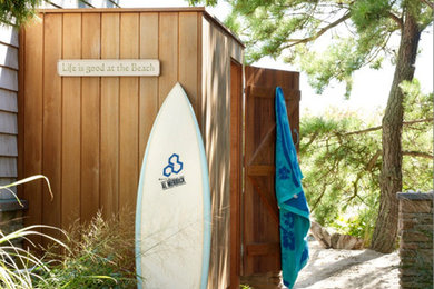 Example of a beach style exterior home design in Other