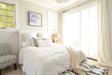 Inspiration for a coastal carpeted bedroom remodel in San Diego with gray walls