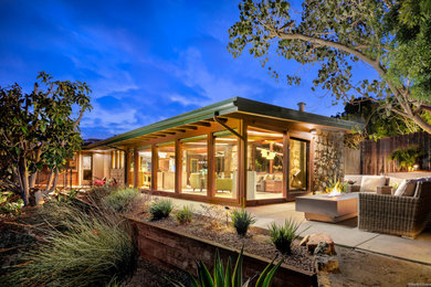 Inspiration for a mid-century modern home design remodel in San Diego