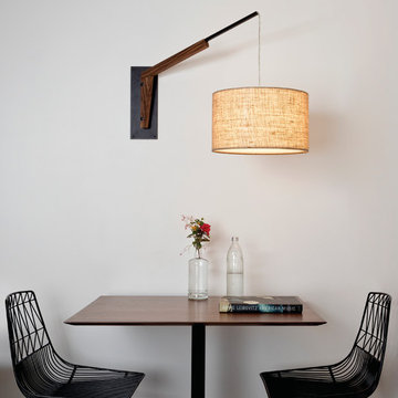 Talea - One-Light Articulate Wall Sconce above Mini Dining Set - Textured Black