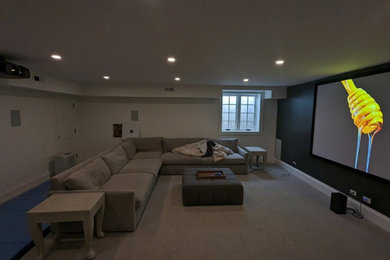 Home Theater with 135" screen and Dolby Atmos