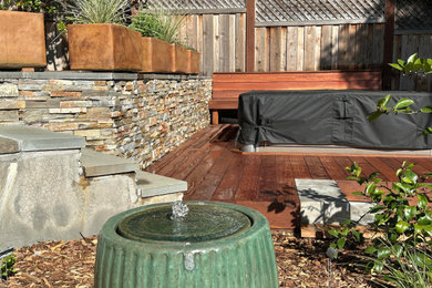 Patio - mid-sized rustic backyard patio idea in San Francisco with decking