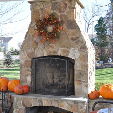 patio,pavilion,outdoor fireplace,indoor fireplace,grill,walkway,walls.