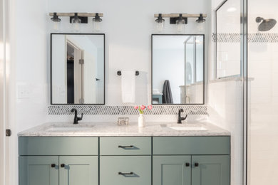 Inspiration for a large country master bathroom in St Louis with shaker cabinets, green cabinets, an alcove tub, an alcove shower, white tile, subway tile, white walls, porcelain floors, an undermount sink, engineered quartz benchtops, beige floor, a hinged shower door, white benchtops, a double vanity and a built-in vanity.