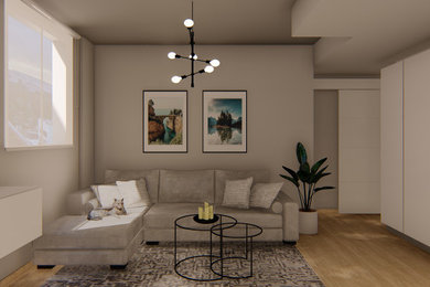 Diseño de sala de estar tipo loft moderna pequeña con paredes grises, suelo de madera en tonos medios y televisor colgado en la pared