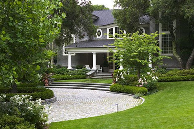 Large elegant gray two-story wood exterior home photo in San Francisco with a shingle roof