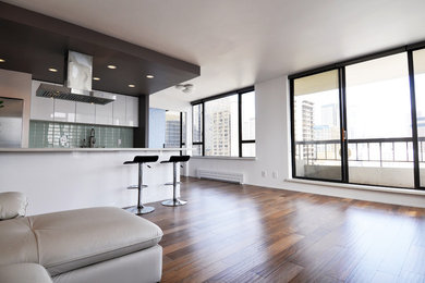 Example of a minimalist living room design in Seattle with white walls