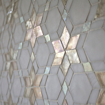 Cool, calming bathroom with statement star mosaic tiles