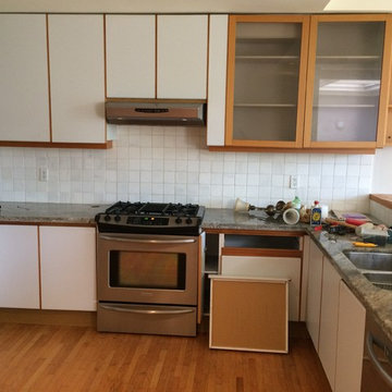 Shaker style kitchen and granite countertop in Toronto