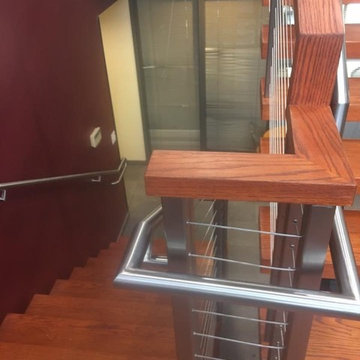 Double steel stringer open risers and cable railing