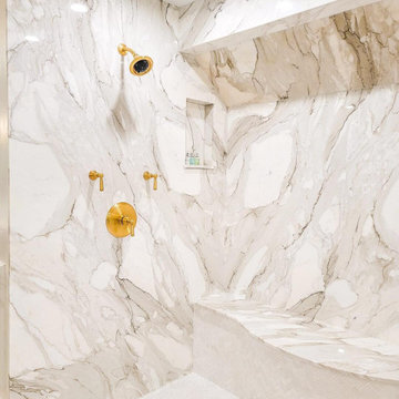 Custom Book-Matched Calacatta Gold Marble Steam Shower