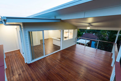 Photo of a small modern home design in Gold Coast - Tweed.