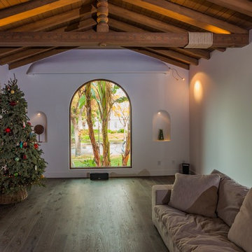 Vaulted Family Room With Arched Window