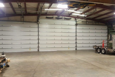Airplane Hanger Door with removable tracks and posts