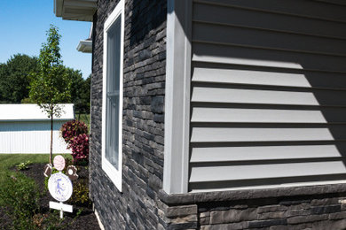 Example of an exterior home design in Other
