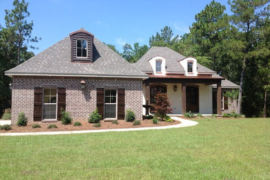Mid-sized traditional white one-story mixed siding exterior home idea in Other
